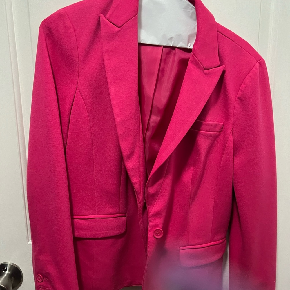 Petite, small pink blazer.  Way bigger than a petite small very big on me